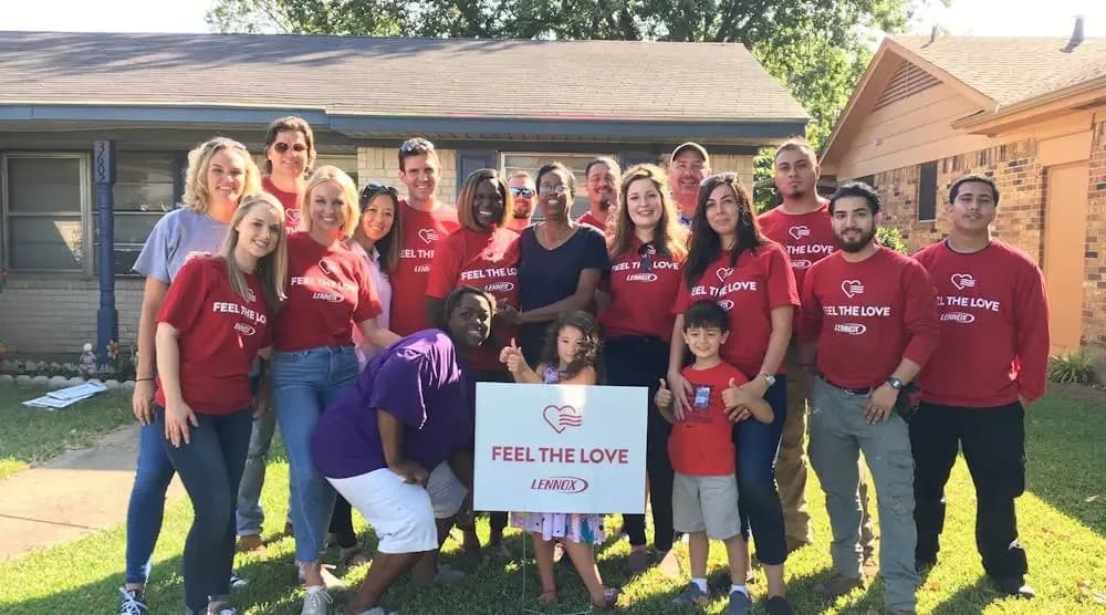 Feel The Love volunteers at a free system installation